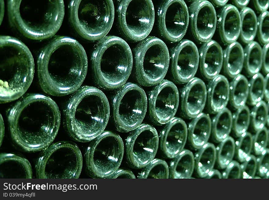 Green wine bottles bottom wall. Green wine bottles bottom wall