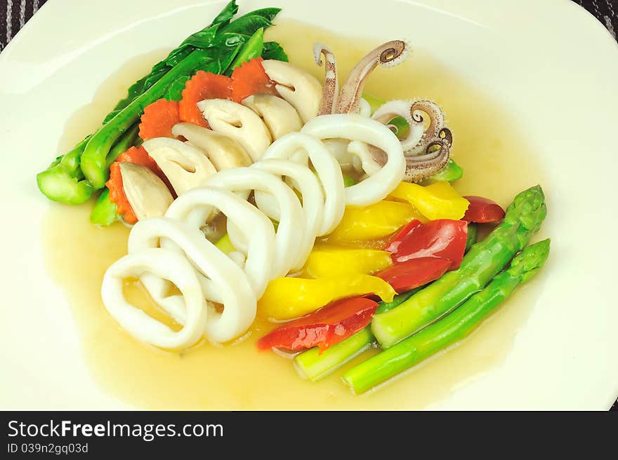 Stir-Fried squid or vegetables whit oyster sauce. Stir-Fried squid or vegetables whit oyster sauce.