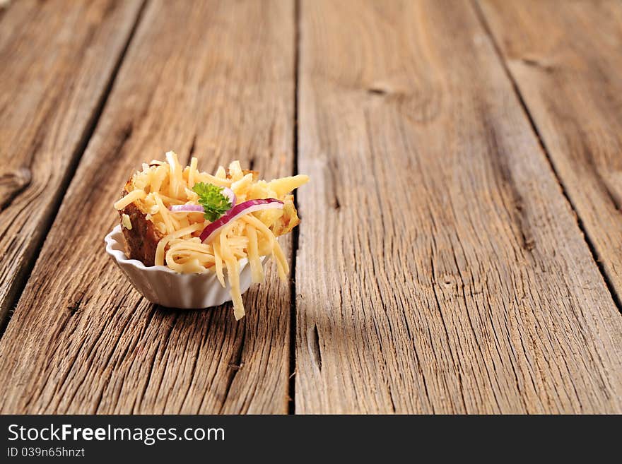 Baked potato and cheese