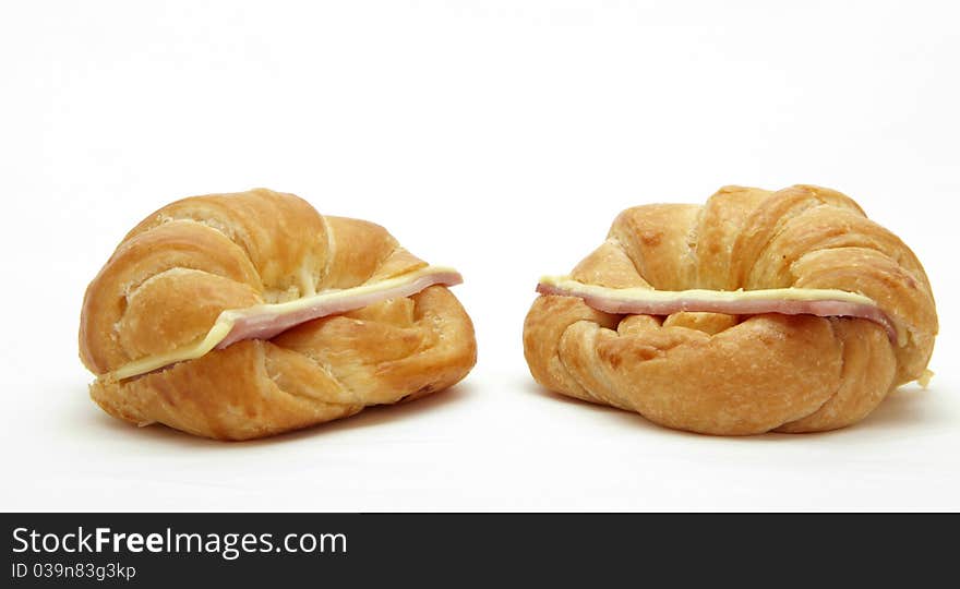 Two Ham Cheese croissant on white. Two Ham Cheese croissant on white