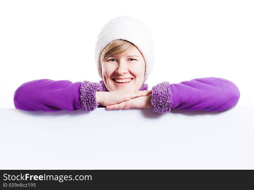 Young woman in a warm cap and a sweater