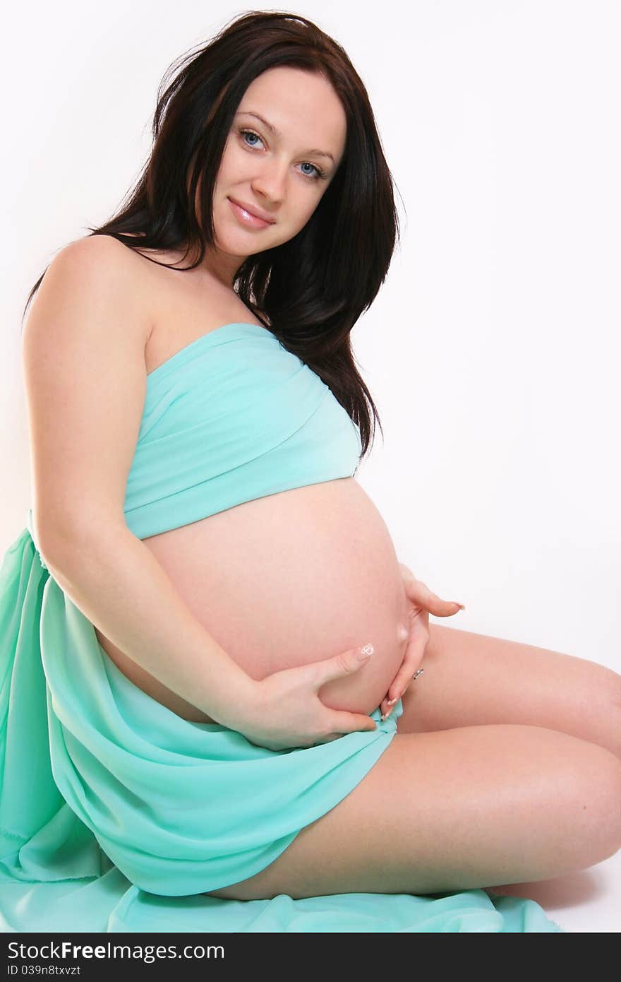 Beautiful pregnant woman expecting a baby boy