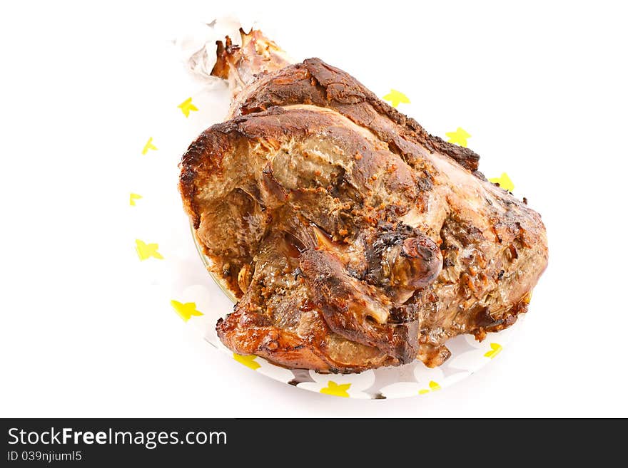 Roast pork leg was photographed on a white background. Roast pork leg was photographed on a white background