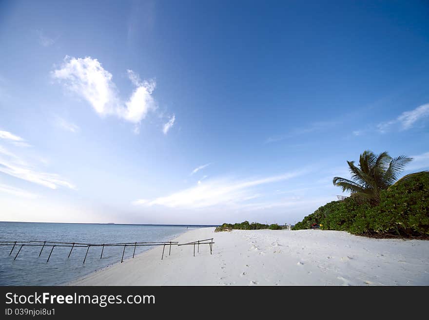 White sand beach and blue blue sky