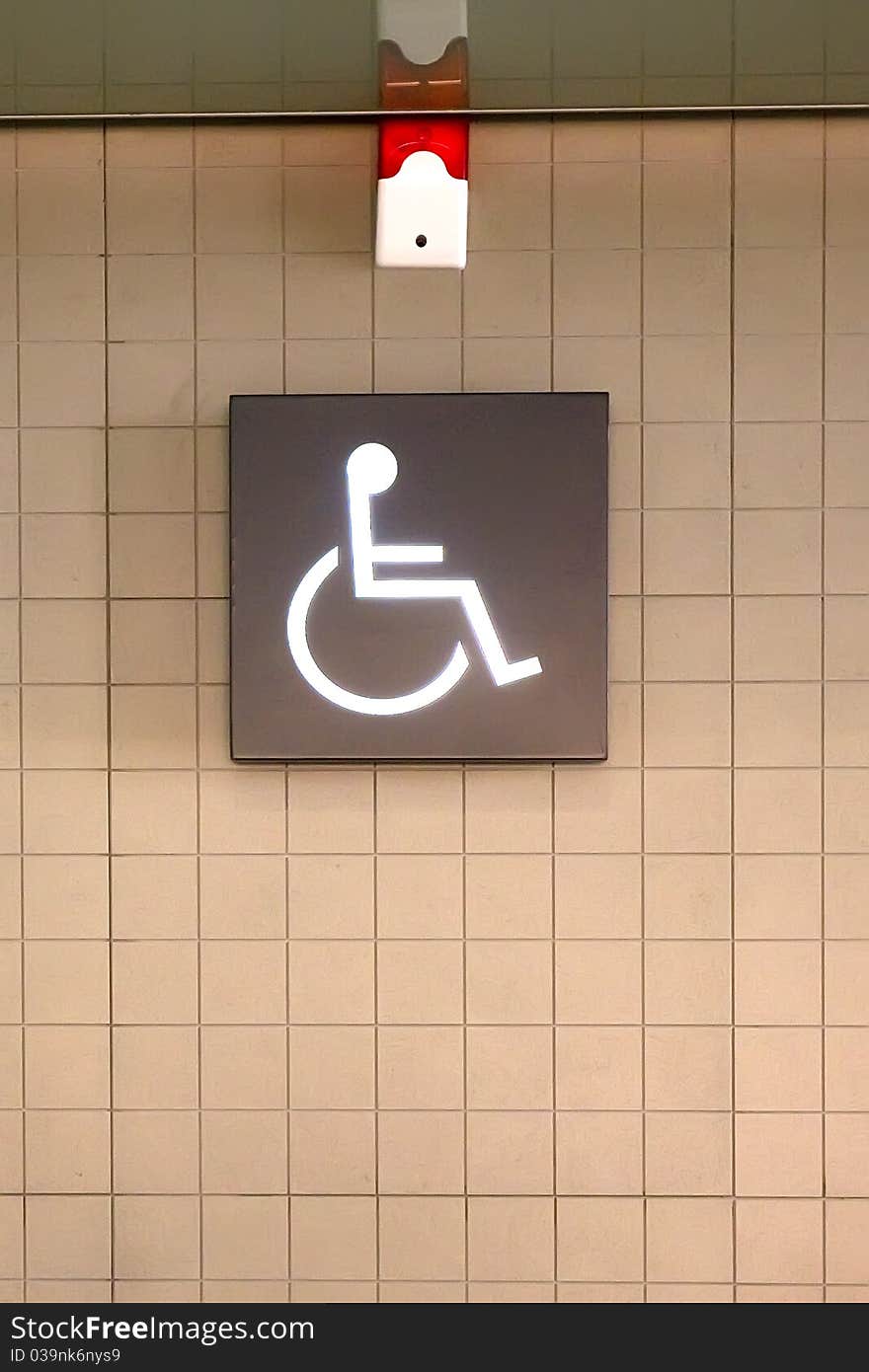 This is the WC door sign, inform people with disabilities, there is set up for their use of the device. This is the WC door sign, inform people with disabilities, there is set up for their use of the device.