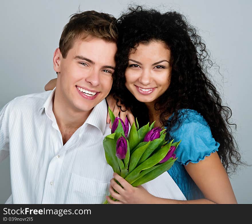 Young couple  over blue background