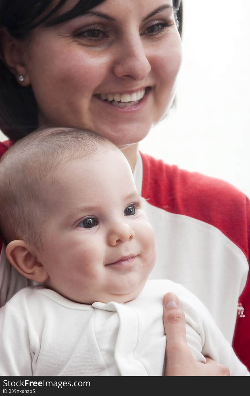 Happy mother with baby isolated