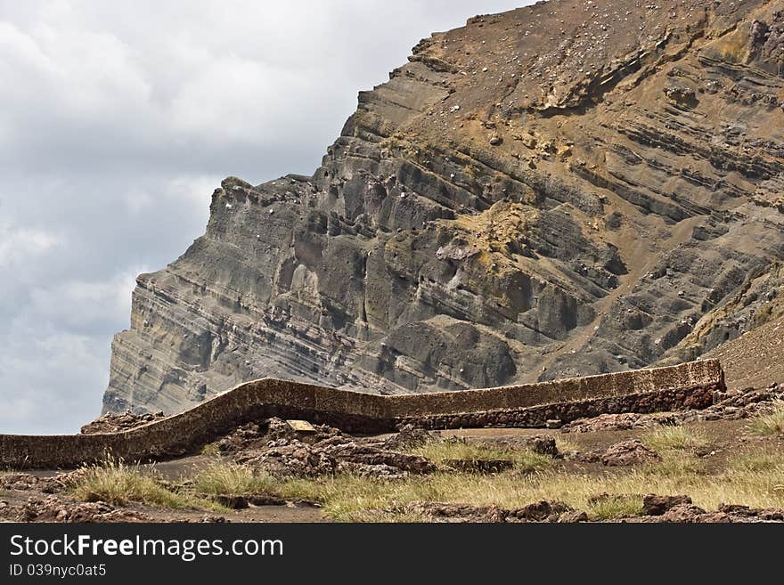 A stone fence along the rim of the Nindiri volcano in Nicaragua. A stone fence along the rim of the Nindiri volcano in Nicaragua