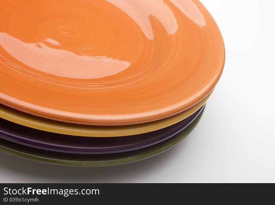 Colorful ceramic plates for the main dishes.