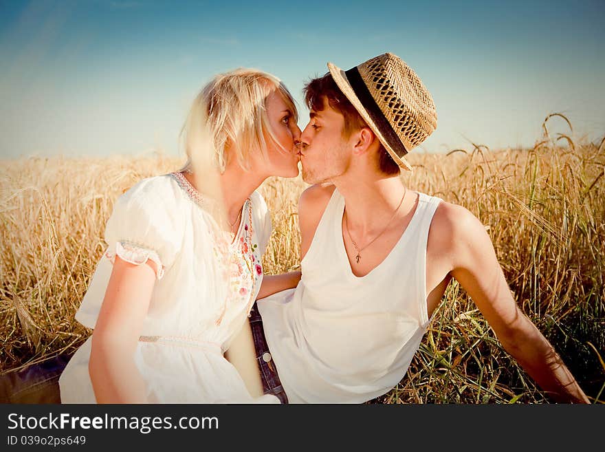 Image Of Young Man And Woman On Wheat Field