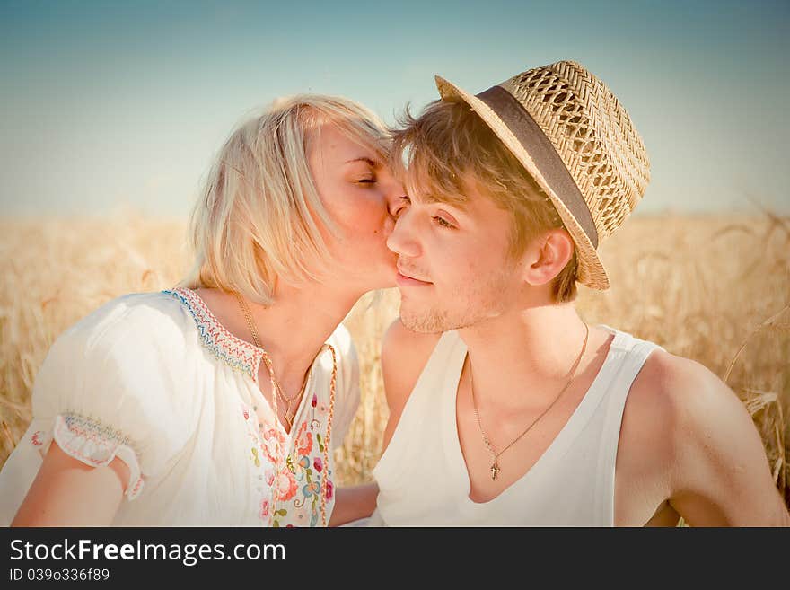 Image Of Young Man And Woman On Wheat Field