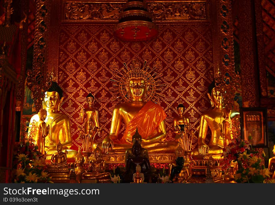 Buddha statue in the luxurious church, Wat Pra Sing, Chiangrai, Thailand. Buddha statue in the luxurious church, Wat Pra Sing, Chiangrai, Thailand