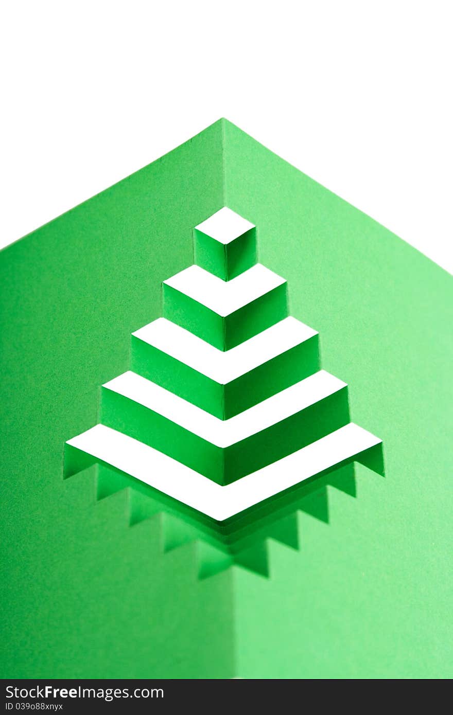 Abstract green paper composition with cutout stripes and folds, rhombus shape