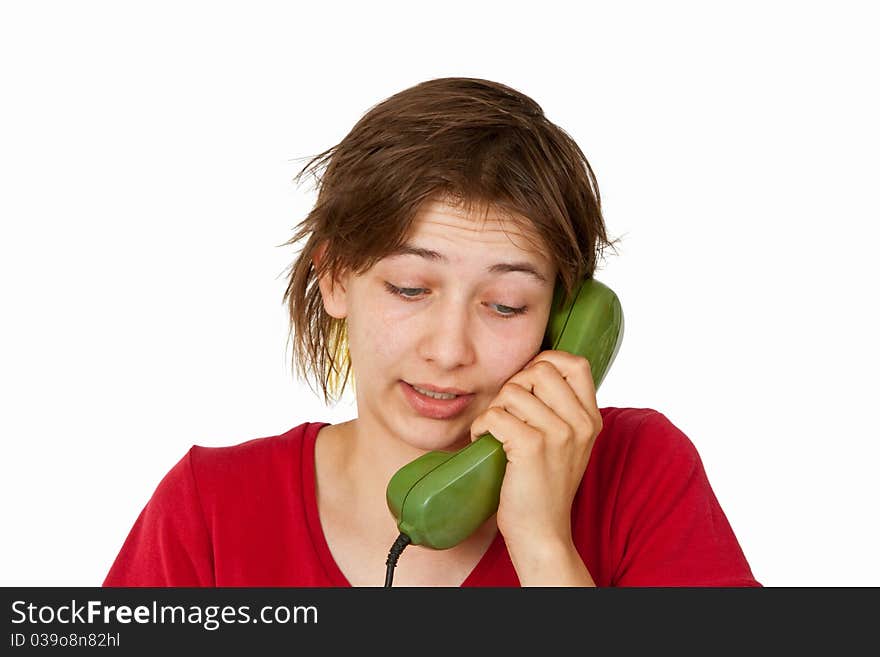 Young woman talking on telephone - isolated on white background. Young woman talking on telephone - isolated on white background