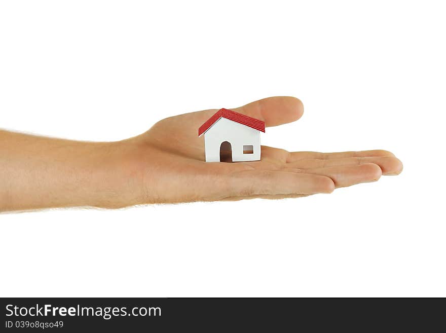 Human holding little paper model of village house, isolated. Human holding little paper model of village house, isolated