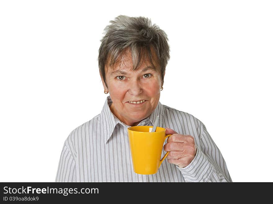 Female senior with cup of coffee isolated on white background. Female senior with cup of coffee isolated on white background