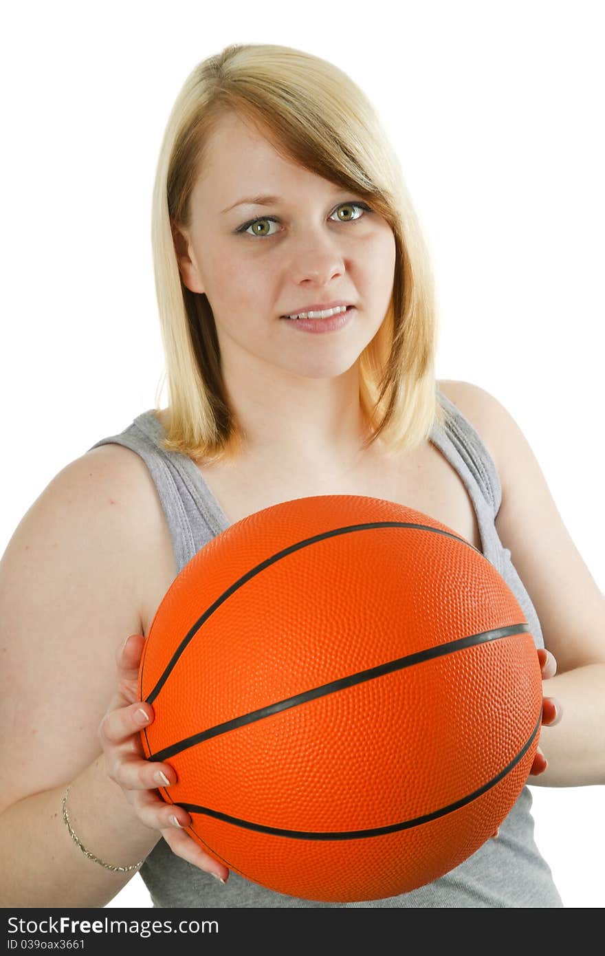 Fitness girl with basketball on a white background. Fitness girl with basketball on a white background