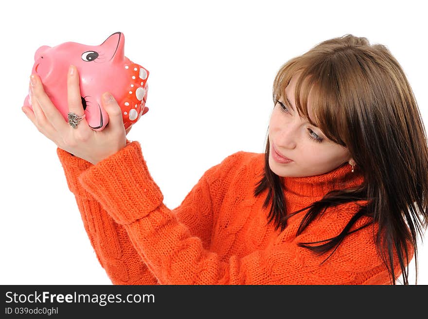 Young beautiful woman standing with piggy bank (money box), isolated on white background. Young beautiful woman standing with piggy bank (money box), isolated on white background