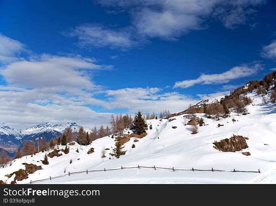 A graze in the North of the italian Alps during winter, Lombardy region, Italy. A graze in the North of the italian Alps during winter, Lombardy region, Italy