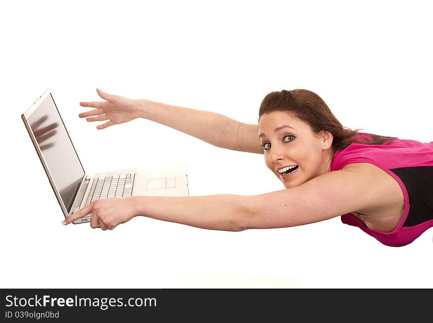 Woman blowing away from laptop