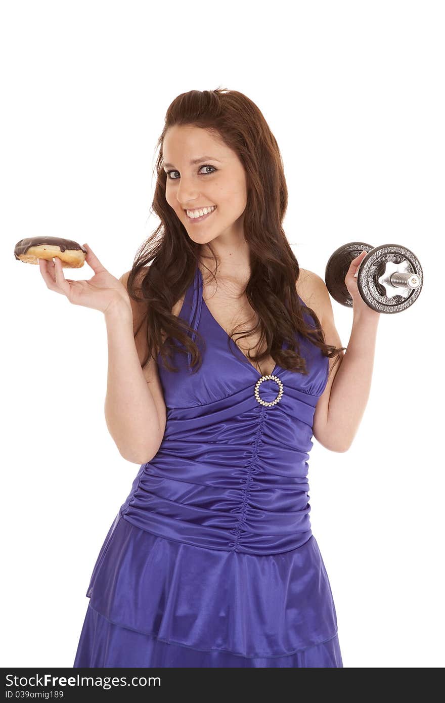 Woman blue dress weights smile at donut