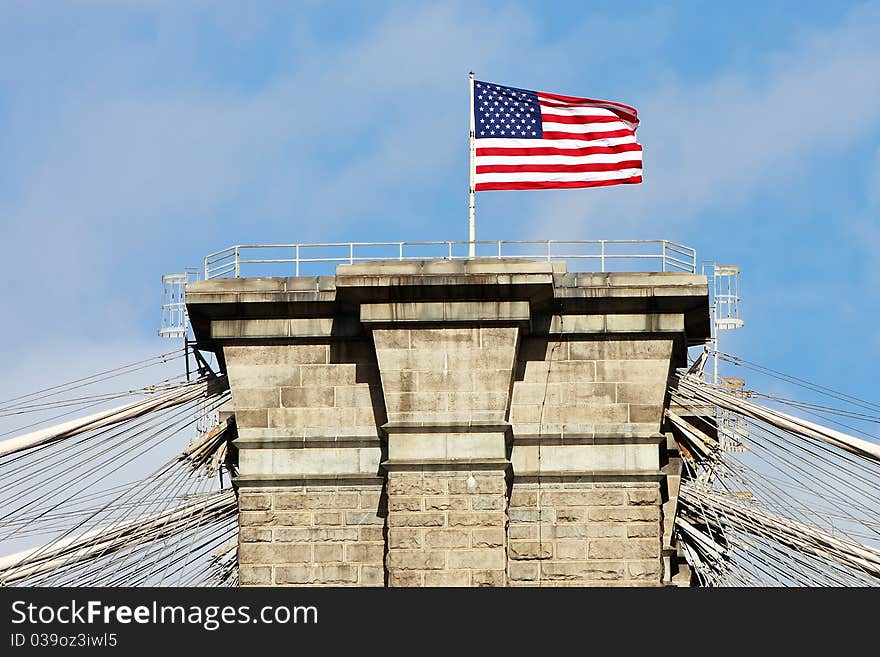 American flag on the top Brooklyn Bridge