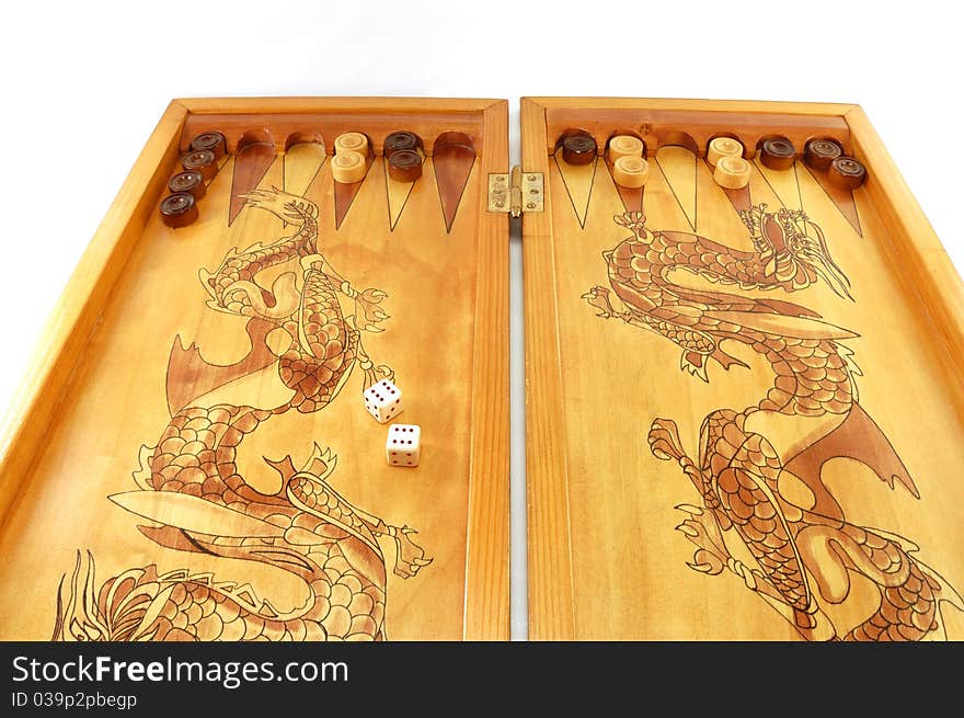 Backgammon board game with dice isolated on a white background. Backgammon board game with dice isolated on a white background