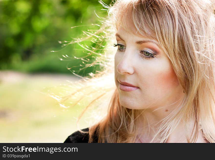 Beautiful blond girl's face closeup. Beautiful blond girl's face closeup