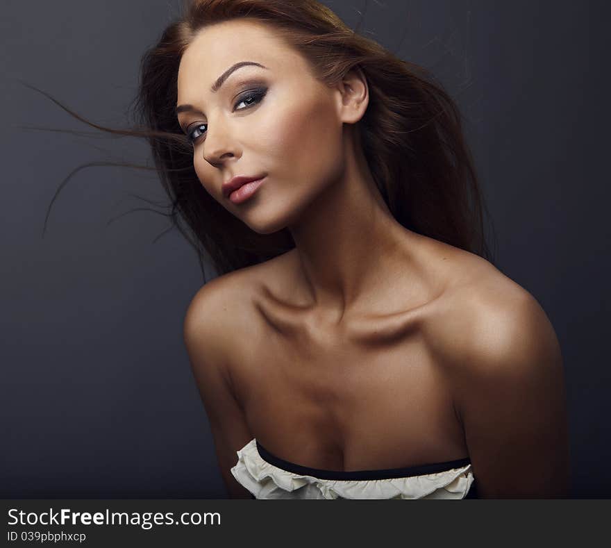 Attractive young woman with red hair. Photo.