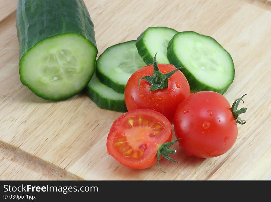 Fresh tomatos and cucumber photography. Fresh tomatos and cucumber photography