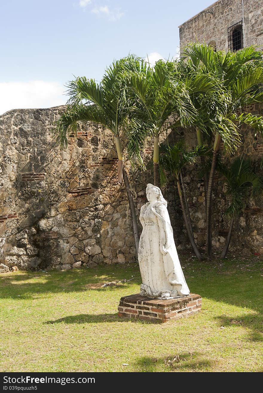 The old statue in front of Alcazar de Colon ( Columbus house). Santo Domingo. Dominican republic