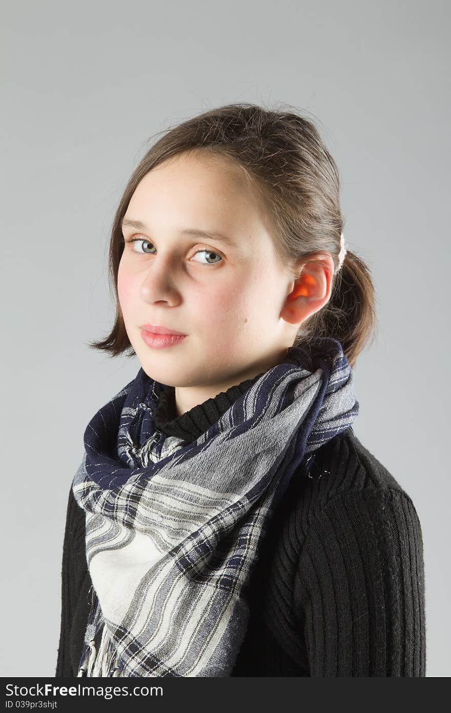 Young cute Teen, on gray background