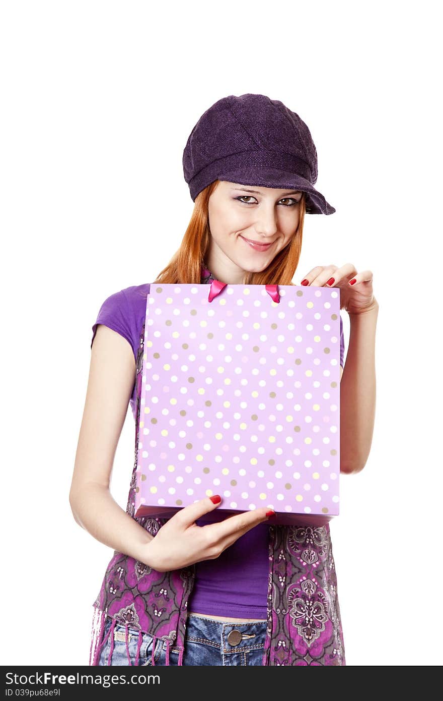 Shopping girl in violet with bag