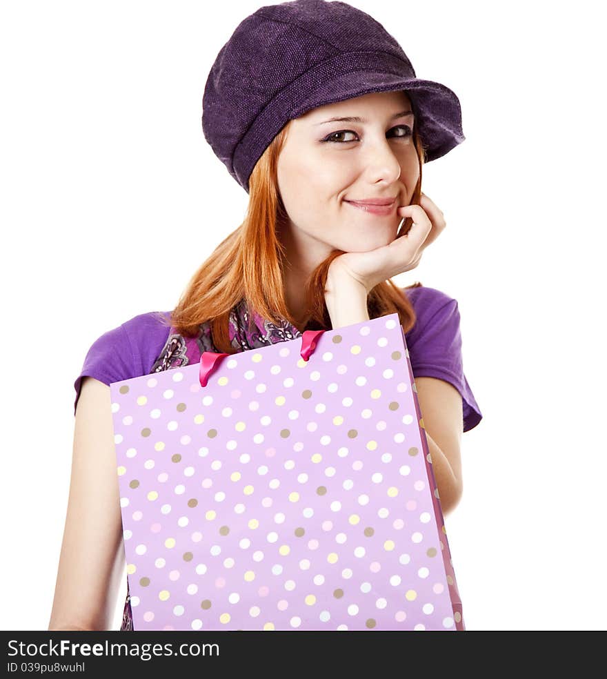 Shopping girl in violet with bag