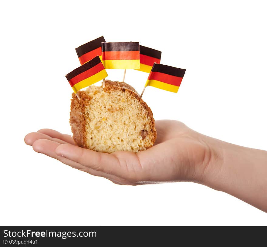 Hand keep cake with germany flags.