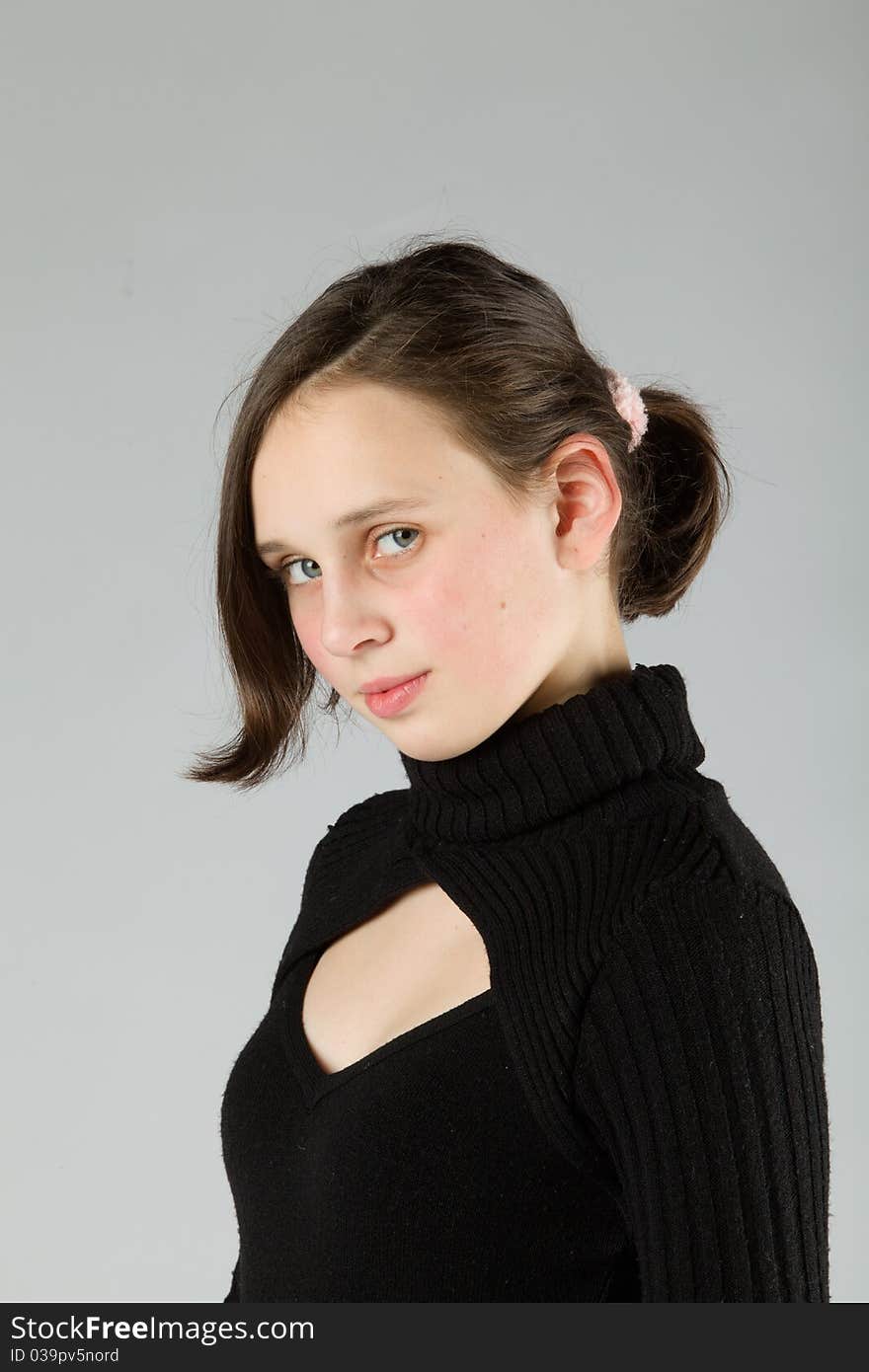 Young cute Teen, on gray background