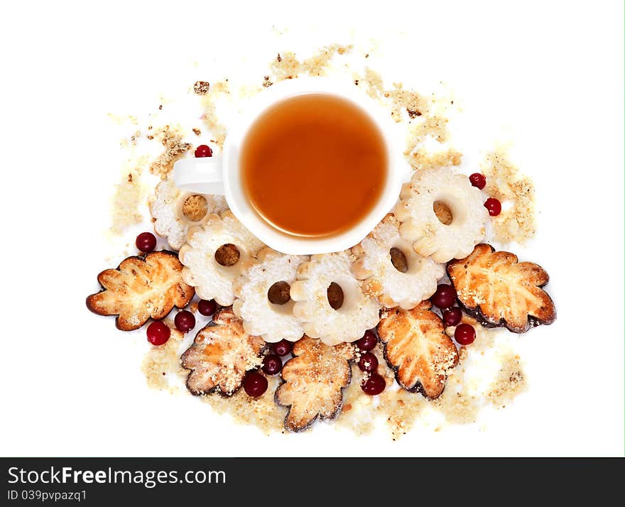 Cookie flowers and leaves and a cup of tea