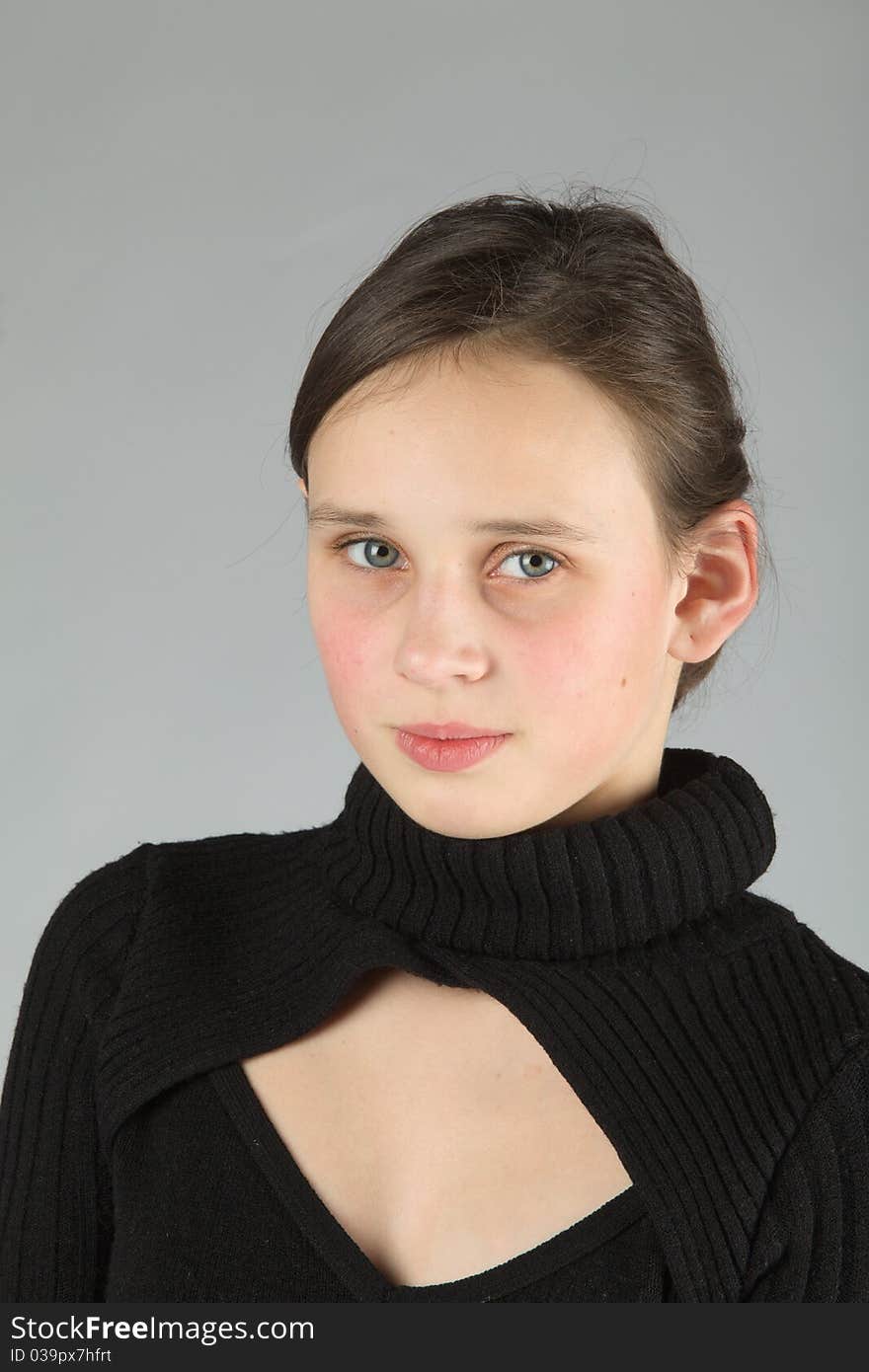 Young cute Teen, on gray background