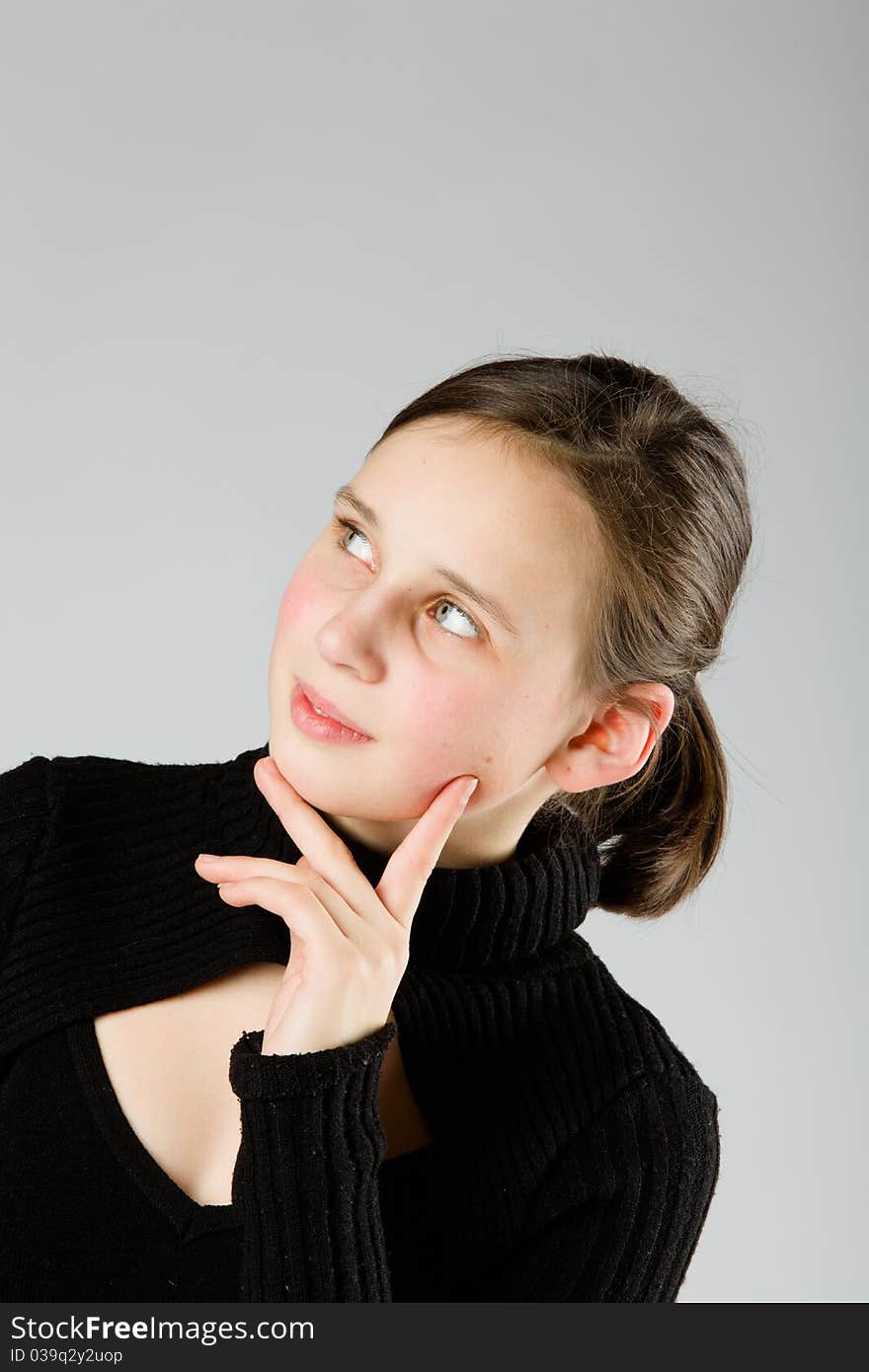 Young cute Teen, on gray background