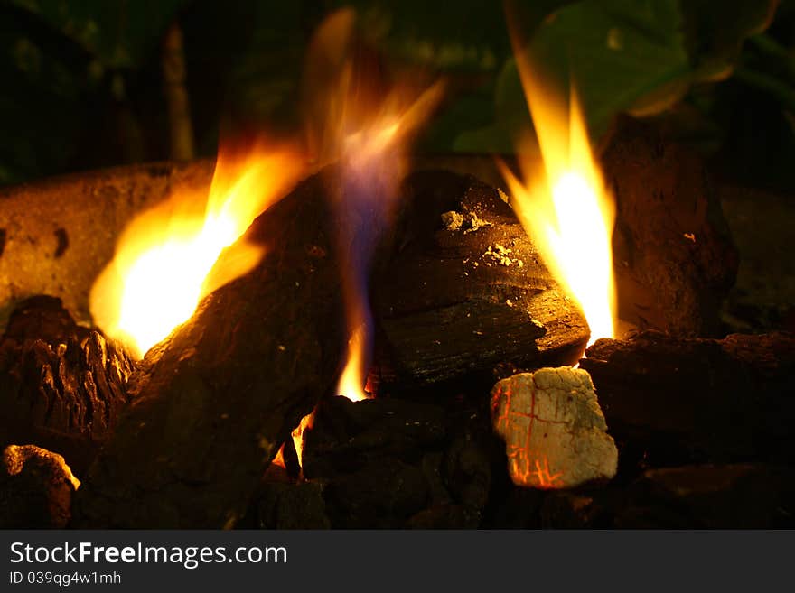 Dark coal in fire for some barbecue