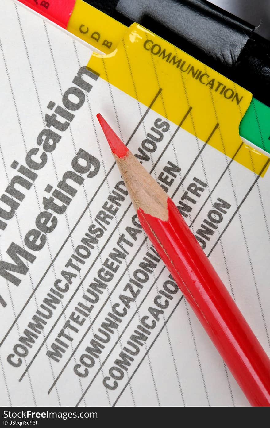 Note book communication and meeting record with a red pencil, shown as daily woking and communication. Note book communication and meeting record with a red pencil, shown as daily woking and communication.