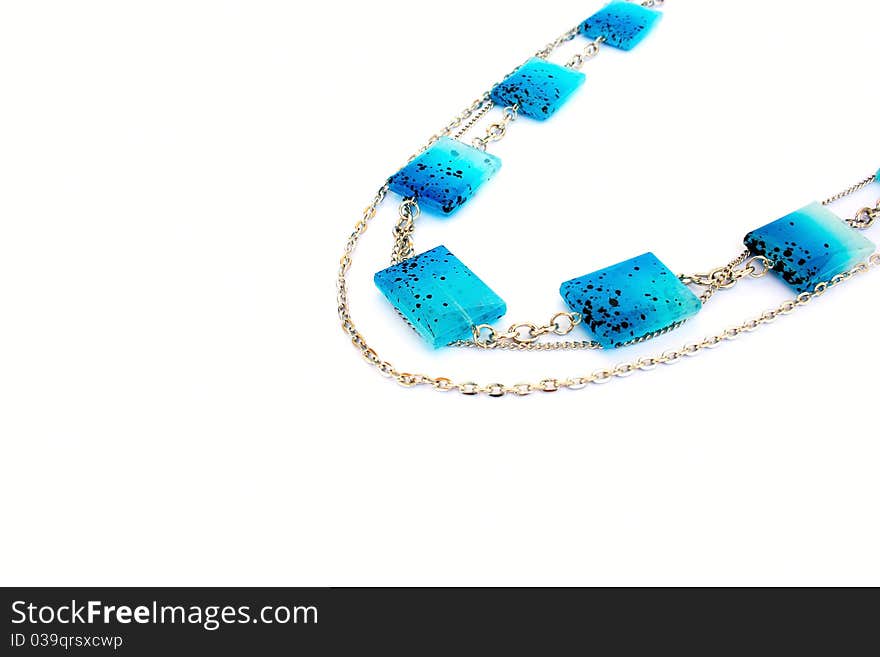 Blue necklace isolated on white background.