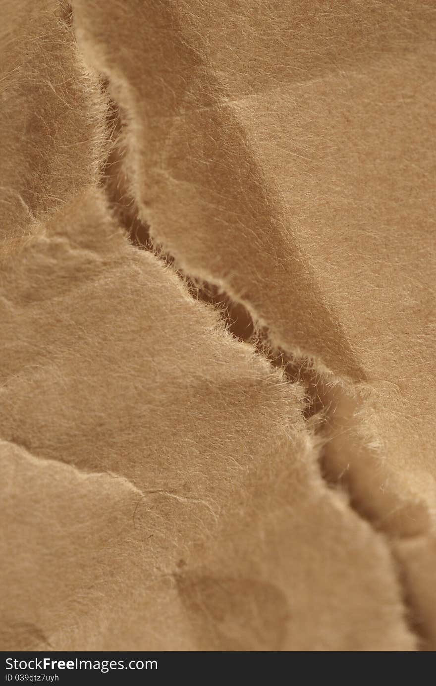 Old Brown Torn  Paper Background