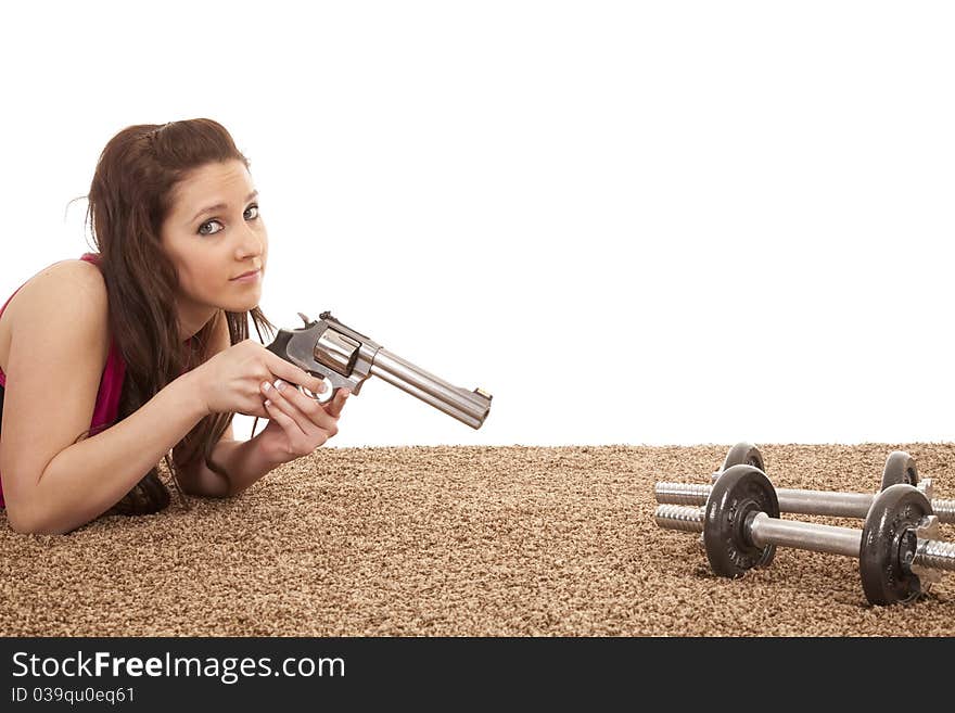 Woman Pointing Gun At Weights Serious