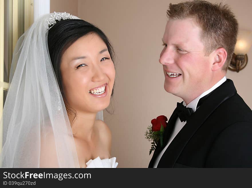 Beautiful couple on their wedding day in traditional attire. Beautiful couple on their wedding day in traditional attire