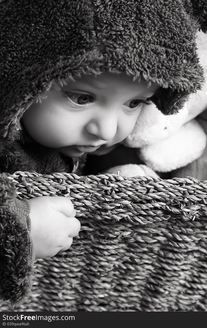 Four month old baby boy wearing a fully bear suit. Four month old baby boy wearing a fully bear suit