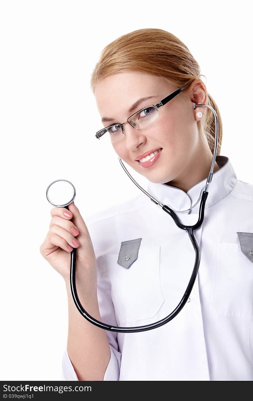 Attractive nurse with a stethoscope on a white background. Attractive nurse with a stethoscope on a white background