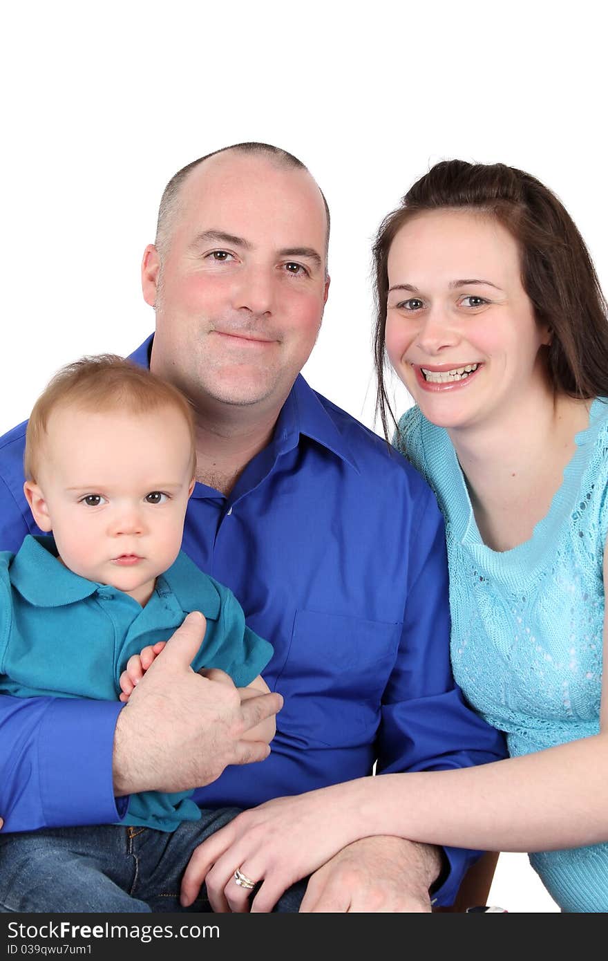 Family of three against a white background