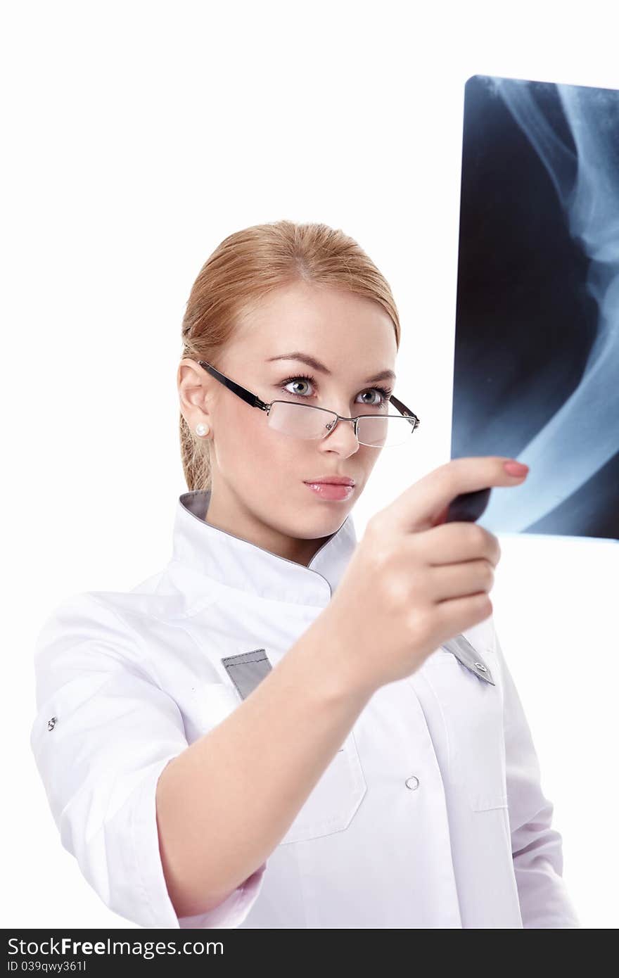 The young doctor with x-rays on a white background