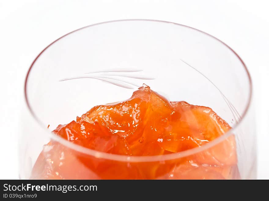 Jam from apples in glass, closeup, on white background. Jam from apples in glass, closeup, on white background